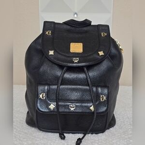 MCM Black Leather Studded Backpack Gold Hardware Drawstring Side Zip